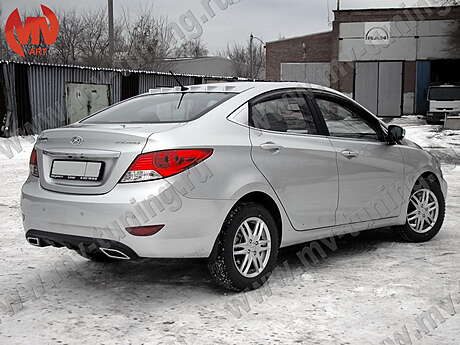 Диффузор заднего бампера var№1 (под окраску) Hyundai Solaris (2010-2013)